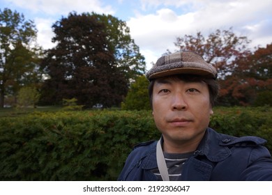 A Man Standing At High Park In Bloor Street West In Toronto City Of Ontario, Canada