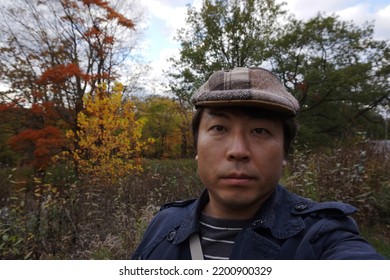 A Man Standing At High Park In Bloor Street West In Toronto City Of Ontario, Canada