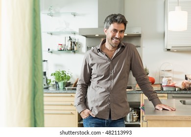 Man standing in kitchen