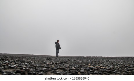 Man Standing In The Middle Of Nowhere