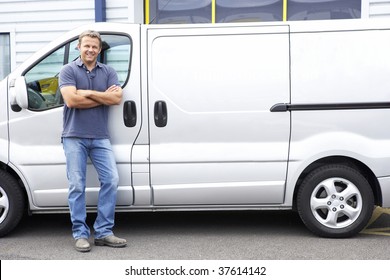 Man Standing Next To Van