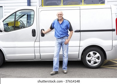 Man Standing Next To Van