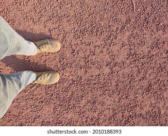 Man Standing On Raw Steel Pig Iron Bolls 