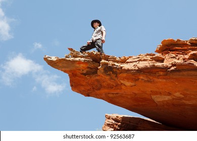 Man Standing On The Rock Edge, Western Australia Outback