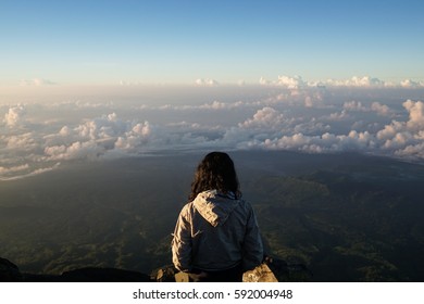 man standing over clouds