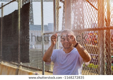 Similar – Image, Stock Photo Man Escaping Heat Under Air Conditioner