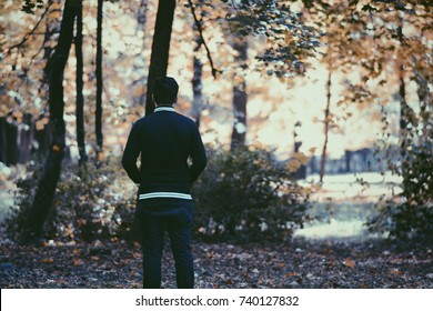 Man Staring At Forest