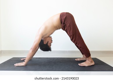 Man Start Doing Beginner For Yoga .Downward Facing Dog Yoga Pose