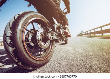 Man Start With His Motorbike. Outdoors Adventures And Freedom Concept. Restart Concept