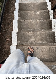 A man Step down the stairs
