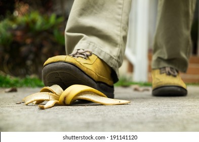 Man Stepping On Banana Peel