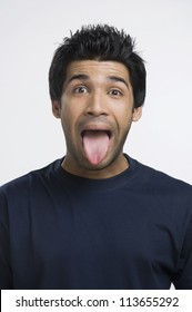 Man Sticking His Tongue Out