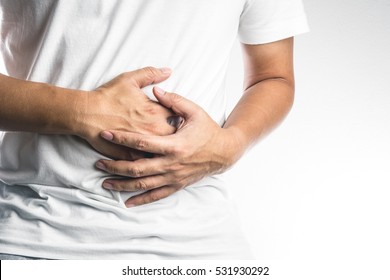 Man With Stomach Pain On White Background