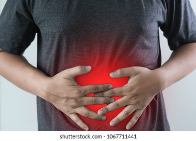 man stomach suffering and having a stomachache