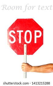 Man with Stop Sign. A red and white stop sign. hand held traffic control stop sign. 