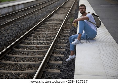 Similar – man traveling in train carriage