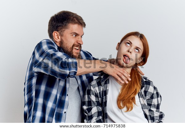 Man Strangling Woman Showing Tongue Stock Photo Edit Now 714975838.