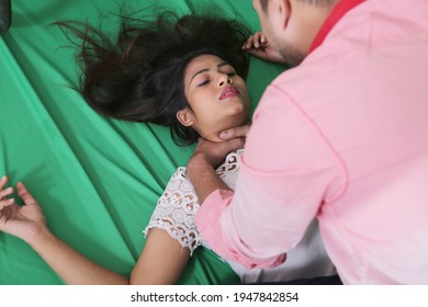 A Man Strangling A Women