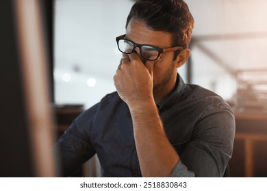 Man, stress and eye strain in office at night, computer glitch and deadline pressure for journalist. Male person, overwhelmed and anxiety for time management, 404 error and frustrated with mistake - Powered by Shutterstock