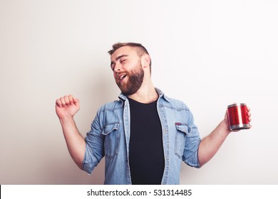 Man Stretching After Wake Up With Cup Of Coffee Isolated Over Gray Background