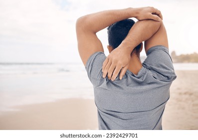 Man, stretching and arms on beach, exercise and warm up for fitness, ready and workout by ocean. Male person, back and active in outdoors, challenge and prepare for performance, training and shore - Powered by Shutterstock