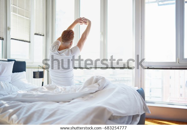 Man Stretching Bed Back View Stock Photo 683254777 | Shutterstock