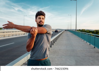 Man stretching before his run