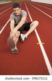 A Man Stretching Before Working Out.