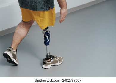 A man strides forward, showcasing the functionality of his advanced prosthetic leg, symbolizing mobility and independence - Powered by Shutterstock