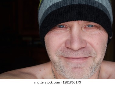 a man in a striped hat