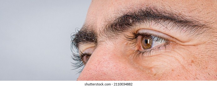 Man Strong Bushy Eyebrows Closeup 