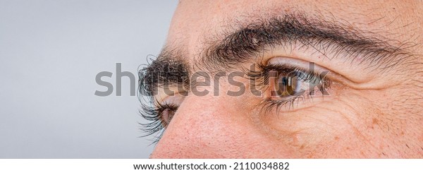 man strong bushy eyebrows\
closeup 