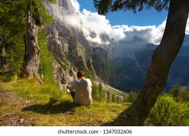 Man studying a map in the mountain landscape, Triglav National Park, Slovenia