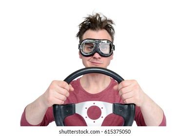 Man in stylish goggles with steering wheel isolated on white background, car driver concept