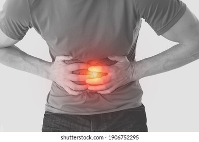 Man Suffering From Abdominal Pain.