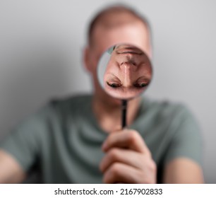 Man Suffering From Bipolar Disorder, Distorted Self Perception. High Quality Photo