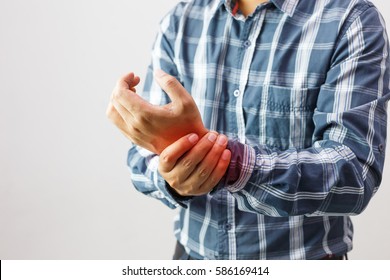 Man Suffering From Elbow Joint Pain People /  Healthcare And Problem Concept