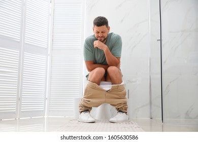 Man Suffering Hemorrhoid On Toilet Bowl Stock Photo 1605630586 ...