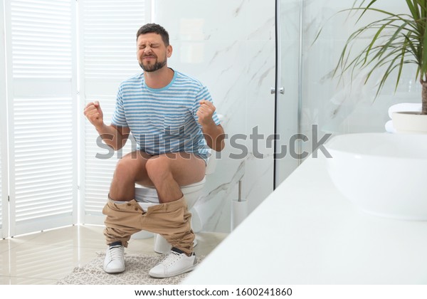 Man Suffering Hemorrhoid On Toilet Bowl Stock Photo 1600241860 ...