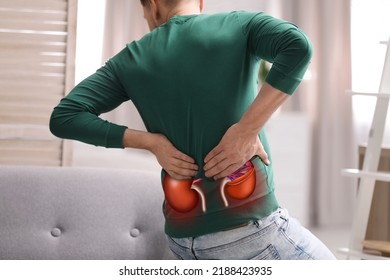 Man Suffering From Kidney Pain At Home, Closeup