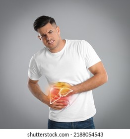 Man Suffering From Liver Pain On Grey Background