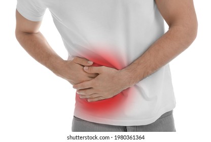 Man Suffering From Pain In Lower Right Abdomen On White Background, Closeup. Acute Appendicitis