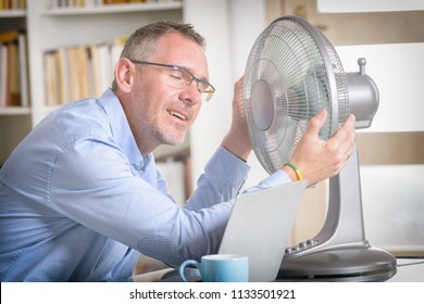 man-suffers-heat-while-working-260nw-113