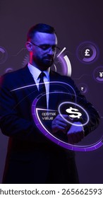 Man in a suit checking optimal value on smartwatch with glowing dollar icon in neon lightning. Concept of smart banking, personal finance tech, wearables, fintech value interfaces, mobile dashboards.