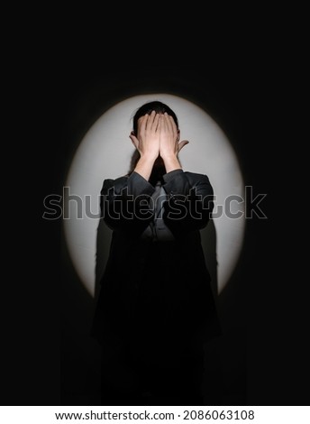 Similar – depressed man closes his eyes with his hands