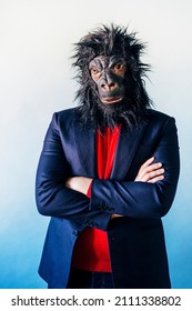 Man In A Suit And With A Gorilla Mask.