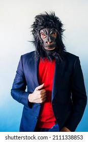 Man In A Suit And With A Gorilla Mask.