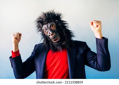 Man In A Suit And With A Gorilla Mask.