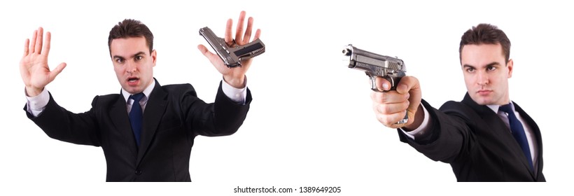 Man In Suit With Gun Isolated On White 