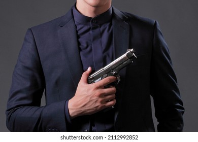 Man Suit Holding Gun Hand On Stock Photo (Edit Now) 2112992852